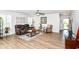 Comfortable living room featuring wood flooring, recessed lighting, and stylish furnishings at 1530 Gristmill Meadows Dr, Westfield, IN 46074