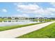 Scenic view of the community pond and walking path, creating a serene and inviting atmosphere at 1530 Gristmill Meadows Dr, Westfield, IN 46074