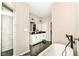 Bathroom featuring dual sinks, a walk-in shower, and a soaking tub at 1595 N Blue Rd, Greenfield, IN 46140