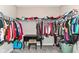 Walk-in closet providing ample storage and clothing racks with a small desk at 1595 N Blue Rd, Greenfield, IN 46140