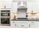 Gourmet kitchen features stainless steel appliances, sleek countertops and gas range at 1595 N Blue Rd, Greenfield, IN 46140