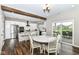 Bright kitchen with stainless appliances and a large center island adjoins the dining area at 1595 N Blue Rd, Greenfield, IN 46140