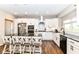 Bright kitchen with stainless appliances and a large center island provides ample counter space at 1595 N Blue Rd, Greenfield, IN 46140