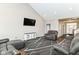 Open concept living room featuring hardwood floors and oversized seating at 1595 N Blue Rd, Greenfield, IN 46140