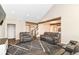 Open concept living room featuring hardwood floors and oversized seating at 1595 N Blue Rd, Greenfield, IN 46140