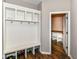 Convenient mudroom area with storage, seating, and coat hooks at 1595 N Blue Rd, Greenfield, IN 46140