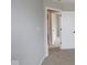 Standard bedroom with neutral carpeting, light gray walls, and a door leading into the closet at 16835 Cheddar Dr, Noblesville, IN 46060
