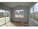 Sunroom with large windows and sliding glass door at 16835 Cheddar Dr, Noblesville, IN 46060