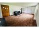Inviting living room featuring a sliding barn door and comfortable seating at 1739 Crystal St, Anderson, IN 46012
