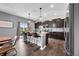 Beautiful kitchen with stainless appliances, island with bar stools, and modern finishes at 1893 Glenmoor Ct, Columbus, IN 47201