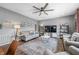 Comfortable and stylish living room featuring a cozy sofa, modern decor, and plenty of natural light, perfect for relaxation at 1893 Glenmoor Ct, Columbus, IN 47201