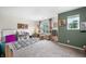 Spacious playroom with carpet, lots of toys, natural light, and cozy decor for children at 1893 Glenmoor Ct, Columbus, IN 47201