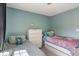 Comfortable bedroom with twin beds, dresser, and carpeting at 2 E Quail Wood Ln, Westfield, IN 46074