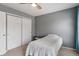 Bedroom with closet, ceiling fan, and neutral colored walls at 2 E Quail Wood Ln, Westfield, IN 46074