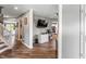 Spacious living room with hardwood floors, open floor plan, and access to other rooms at 2 E Quail Wood Ln, Westfield, IN 46074