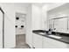 Elegant primary bath with double vanity, modern fixtures, walk in shower, and large walk-in closet at 2243 Hemlock Cir, Greenfield, IN 46140
