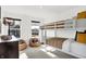 Comfortable bunk bedroom with two bean bag chairs, plush pillows, and lots of natural light at 2243 Hemlock Cir, Greenfield, IN 46140