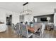 Open dining area with seating for six, features access to living room and kitchen at 2243 Hemlock Cir, Greenfield, IN 46140