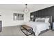 Elegant main bedroom featuring a large upholstered bed, geometric lighting fixture, and three abstract art pieces at 2243 Hemlock Cir, Greenfield, IN 46140