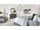 Bright main bedroom featuring a stylish dresser, accent chair, and abundant natural light at 2243 Hemlock Cir, Greenfield, IN 46140