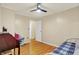 Bedroom with hardwood floors and ceiling fan at 313 E South St, Morristown, IN 46161