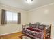 Bedroom with hardwood floors and a large window at 313 E South St, Morristown, IN 46161