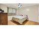 Comfortable bedroom boasts hardwood floors, natural light, and ample space at 313 E South St, Morristown, IN 46161