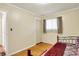 Bedroom with hardwood flooring and closet space at 313 E South St, Morristown, IN 46161