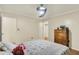 Cozy bedroom with hardwood floors, plenty of natural light, and great closet space at 313 E South St, Morristown, IN 46161