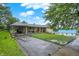 Expansive driveway and well-maintained lawn of this charming home at 313 E South St, Morristown, IN 46161