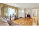 Cozy living room with hardwood floors and decorative accents, a comfortable retreat at 313 E South St, Morristown, IN 46161