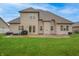 Exterior view of home from back yard and patio at 3247 Moonlight Ct, Columbus, IN 47203