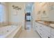 The primary bathroom includes a soaking tub and dual sink vanity with granite counters at 3247 Moonlight Ct, Columbus, IN 47203