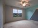 Bedroom with a large window, a ceiling fan, and themed paint at 3247 Moonlight Ct, Columbus, IN 47203