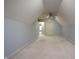 Large bedroom has neutral carpeting, ceiling fan and en-suite bathroom at 3247 Moonlight Ct, Columbus, IN 47203
