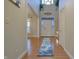 Grand foyer featuring soaring ceilings, hardwood floors, natural light, and a welcoming entrance at 3247 Moonlight Ct, Columbus, IN 47203