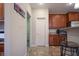 This home features beautiful cabinetry, granite countertops, and a convenient breakfast bar area at 3247 Moonlight Ct, Columbus, IN 47203