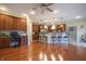 Open concept kitchen with hardwood floors, ample storage, and a workspace/eating area at 3247 Moonlight Ct, Columbus, IN 47203