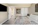 Comfortable bedroom with a view into ensuite bathroom, closets, and stylish decor at 35 Osage Ct, Columbus, IN 47201