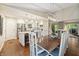 Open floorplan dining room showing view into kitchen and living room, creating a welcoming space for entertaining at 35 Osage Ct, Columbus, IN 47201