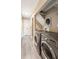 Laundry room featuring modern appliances and ample storage at 35 Osage Ct, Columbus, IN 47201