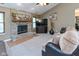 Inviting living room with a brick fireplace, comfortable seating, and neutral decor at 3630 Foxtail Dr, Indianapolis, IN 46235