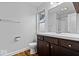 Full bathroom featuring a spacious vanity, toilet, and a shower at 3658 Graceland Ave, Indianapolis, IN 46208