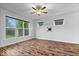 Bright bedroom with hardwood floors and natural light, creating a cozy and inviting atmosphere at 3658 Graceland Ave, Indianapolis, IN 46208