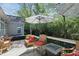 Outdoor deck featuring seating, umbrellas, and a fire table, perfect for gatherings or quiet relaxation at 3815 Harrison Crossing Ln, Greenwood, IN 46142