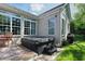 Backyard deck with outdoor furniture and a hot tub, creating a relaxing outdoor oasis at 3815 Harrison Crossing Ln, Greenwood, IN 46142