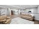 A fully equipped entertainment basement featuring kitchen, and living room areas at 3815 Harrison Crossing Ln, Greenwood, IN 46142
