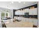 Modern kitchen with granite countertops, stainless appliances, and island with seating at 3815 Harrison Crossing Ln, Greenwood, IN 46142