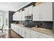 Charming kitchen features granite countertops and ample cabinet storage at 3815 Harrison Crossing Ln, Greenwood, IN 46142