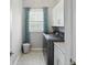 Convenient laundry room with modern washer and dryer, plus ample counter space at 3815 Harrison Crossing Ln, Greenwood, IN 46142